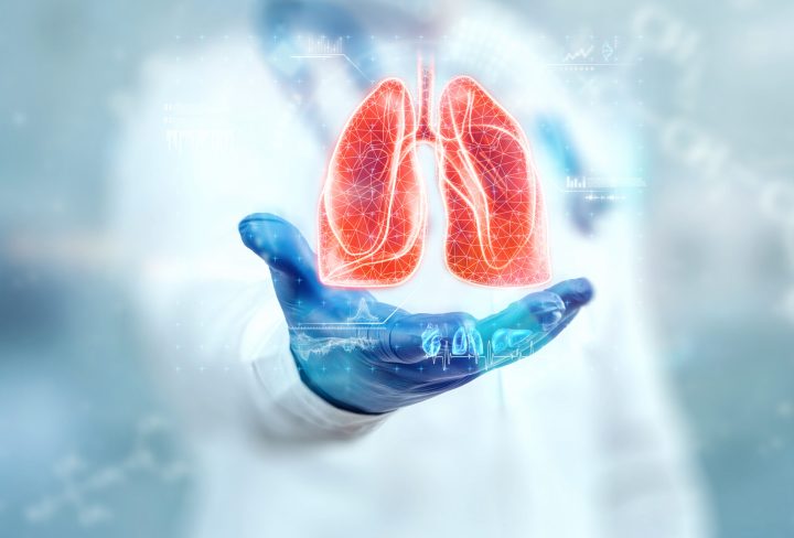 The doctor looks at the hologram of Lungs, checks the test result on the virtual interface and analyzes the data. Pneumonia, donation, innovative technologies, medicine of the future